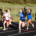 RYAN SPARKS | THE DAILY WORLD Elmas Eliza Sibbett, right, hands the baton off to Audreauna Kanios while Montesanos MaKenzie Eaton, left, receives the handoff from Sam Roundtree during the girls 4x100 relay at the Ray Ryan Memorial All-County Meet on Friday in Ocean Shores.
RYAN SPARKS | THE DAILY WORLD Elmas Eliza Sibbett, right, hands the baton off to Audreauna Kanios while Montesanos MaKenzie Eaton, left, receives the handoff from Sam Roundtree during the girls 4x100 relay at the Ray Ryan Memorial All-County Meet on Friday in Ocean Shores.