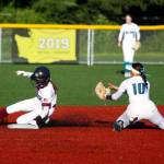 RYAN SPARKS | THE DAILY WORLD Montesanos Lex Stanfield, left, slides in safely at second base ahead of the tag of Auburn Riversides Bailee Brader during the Bulldogs 7-1 loss on Tuesday in Montesano.