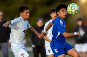 PHOTO BY FOREST WORGUM Elmas Theo Flores, right, makes a play during a 4-0 win over Hoquiam on Wednesday in Elma.