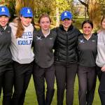SUBMITTED PHOTO Elmas girls golf team of (from left) Olivia Moore, Aubrey Moore, Taylor Staples, Camberly Burgess, Sophia Hamilton and Maddie Clark defeated Montesano on Wednesday at Oaksridge Golf Course in Elma.