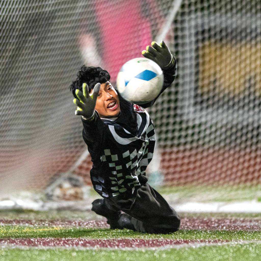 PHOTO BY FOREST WORGUM Raymond-South Bend goal keeper Miguel Perez makes a save in the penalty-kick shootout of a 3-2 win over Montesano on Friday at Jack Rottle Field in Montesano.