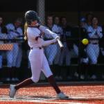 PHOTO BY FOREST WORGUM Montesanos Kaitlyn Trail belts a run-scoring double during a 10-0 win over Hoquiam on Monday in Montesano.