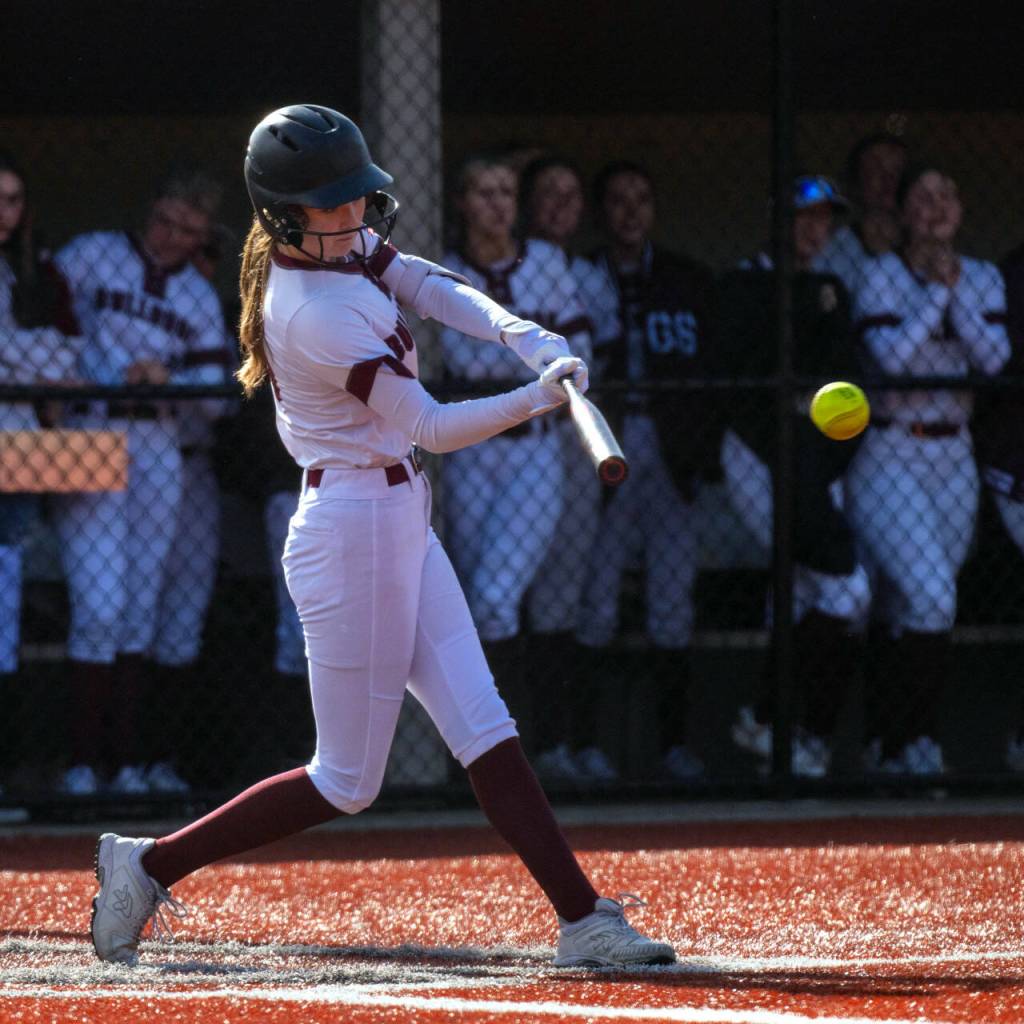 PHOTO BY FOREST WORGUM Montesanos Kaitlyn Trail belts a run-scoring double during a 10-0 win over Hoquiam on Monday in Montesano.