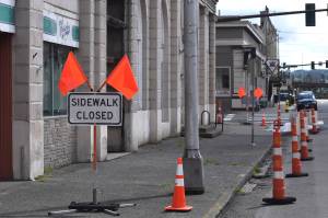 Matthew N. Wells / The Daily World
The city of Aberdeens posted Sidewalk Closed signs along the east side of South I Street  in between the intersection with East Wishkah Street. They arent there for show. Theyre there to keep people safe, because there are parts of the 98-year-old Becker Buildings façade that are falling off the exterior.
