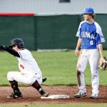 ZACH MARTIN | THE CHRONICLE Elma infielder TJ Dunlap (6) looks on as Teninos Will Feltus (9) celebrates after hitting a game-tying double during a 1A Evergreen League game on Tuesday in Tenino.