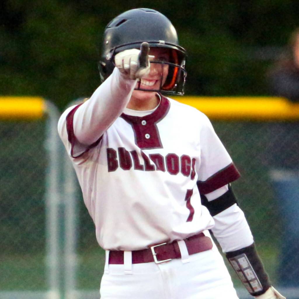 RYAN SPARKS | THE DAILY WORLD Montesanos Alyssa Maldonado points to her teammates after smacking a two-run double in the bottom of the second inning in a 7-0 win over Elma Wednesday night at Montesano High School.