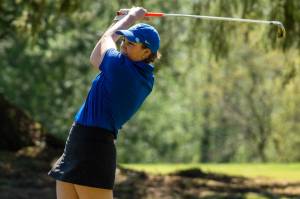 PHOTO BY FOREST WORGUM Elmas Aubrey Moore takes a shot during a 195-195 tie against Montesano on Thursday at the Grays Harbor Country Club in Aberdeen.