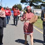 Clayton Franke / The Daily World
Alex Taylor, right, a sophomore in the North Shore School District, Lauren Nabahe, center, a native education program manager in King County, and Rain Gamble, a senior in the Seattle Public Schools district, walk down Point Brown Avenue in Ocean Shores on May 7 during an event to raise awareness for Missing and Murdered Indigenous People.