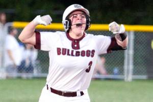 RYAN SPARKS | THE DAILY WORLD Montesano catcher Ali Parkin flexes after hitting a home run in a 3-2 win over Aberdeen on Friday in Montesano.