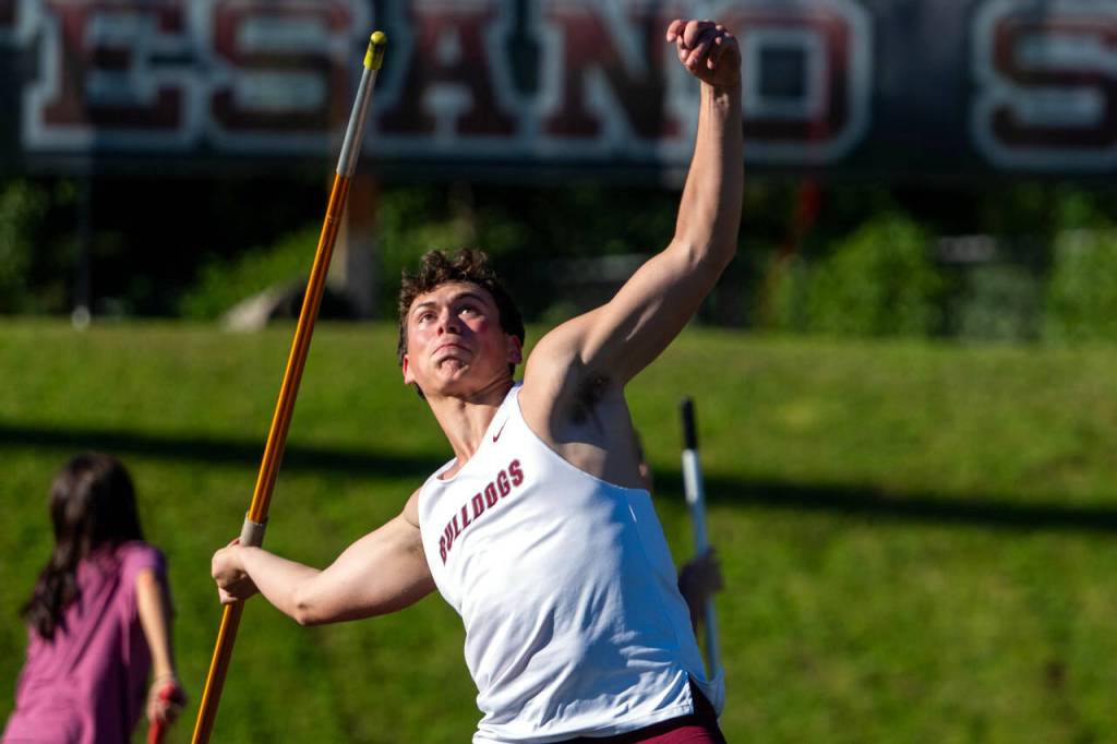 PHOTO BY FOREST WORGUM Montesano senior Gabe Bodwell, seen here in the javelin, won three events to lead the Bulldogs to the team title at the 1A Evergreen Championships on Friday at Montesano High School.
