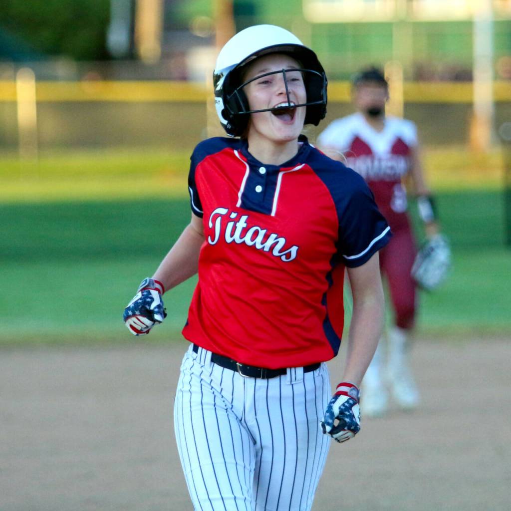 RYAN SPARKS | THE DAILY WORLD Pe Ell-Willapa Valleys Karli Phelps reacts after hitting a go-ahead home run during a 6-4 win over Raymond-South Bend in the 2B District 4 Tournament on Wednesday in Centralia.