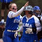 PHOTO BY CHRYSTAL WELD Elmas Lynsee Bednarik (left) congratulates teammate Emmie Spencer after Spencer hit a home run in a 24-10 victory over La Center in a 1A District 4 Tournament game on Saturday at Fort Borst Park in Centralia.