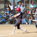 RYAN SPARKS | THE DAILY WORLD Hoquiam shortstop Lexi LaBounty smacks a ball into the outfield during a game against Elma in the 1A District 4 Tournament on Saturday at Fort Borst Park in Centralia.