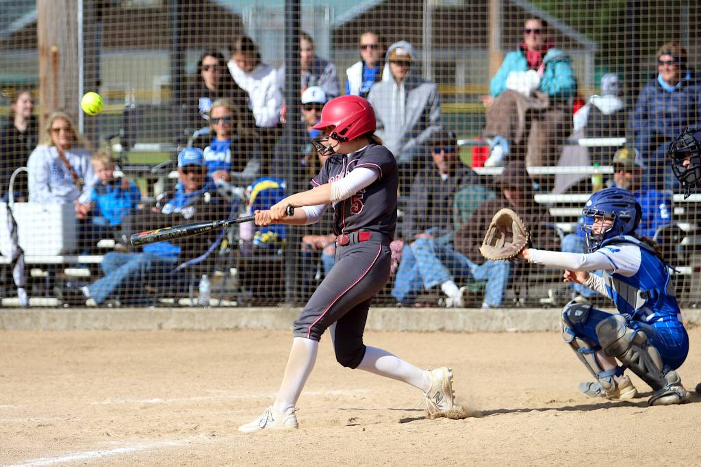 RYAN SPARKS | THE DAILY WORLD Hoquiam shortstop Lexi LaBounty smacks a ball into the outfield during a game against Elma in the 1A District 4 Tournament on Saturday at Fort Borst Park in Centralia.
