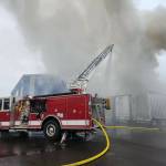 Firefighters work to extinguish a trash fire early Sunday morning. (Courtesy photo / GHFD2)