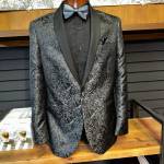 Waughs Mens and Womens Apparel
Waughs Mens and Womens Apparel was well known for its high-end clothing and as the go-to place to get a tux.