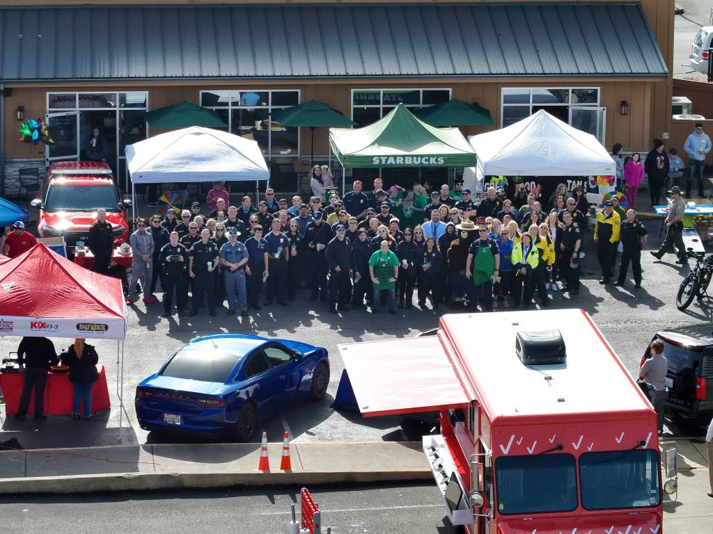 About 100 volunteers took part in the Badges and Brews event hosted by the Aberdeen Starbucks. (Aberdeen Police Department)