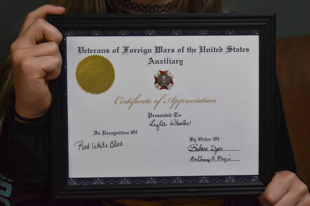 Matthew N. Wells / The Daily World
The customized plaque that each of the three winners received for their singing prowess on The Star Spangled Banner.