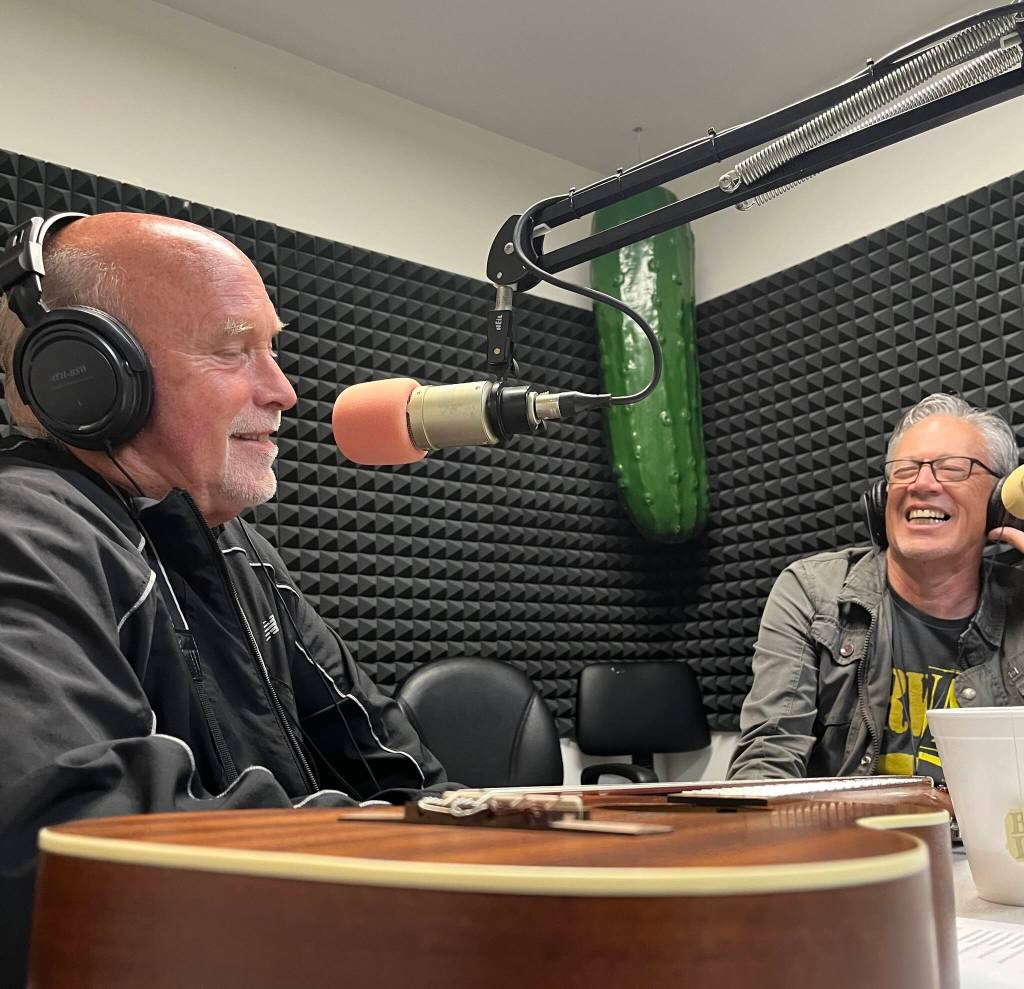 On Tuesday, Darrell Westmoreland, left, talks with Wil Russoul, right, and Roger Fisher of Heart, who called in to Johnny Mansons Local Matters radio show on 94.7 FM. Once Fisher called in, the official announcement was made that Westmoreland would receive his star on the Aberdeen Walk of Fame. (Matthew N. Wells / The Daily World)