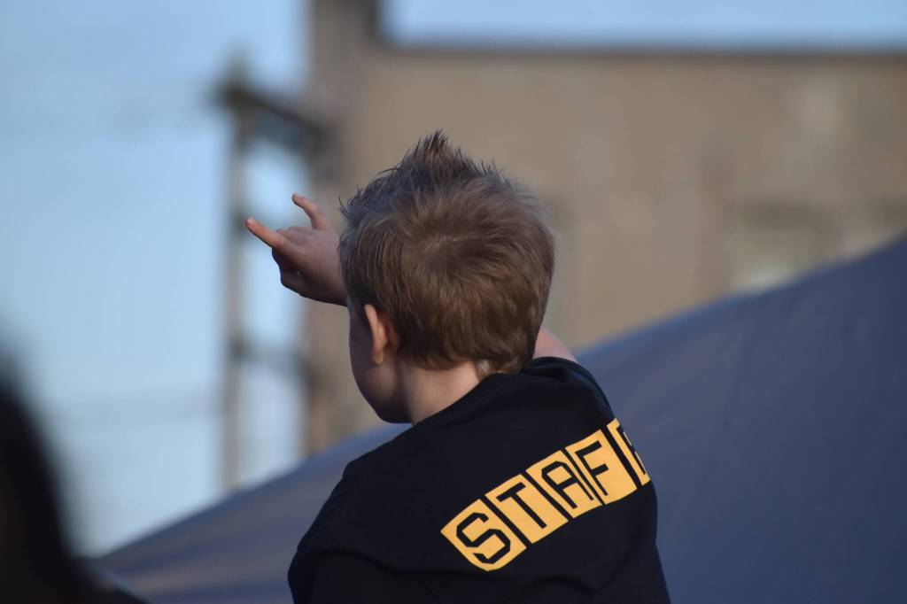 Matthew N. Wells / The Daily World
A young fan, boosted on the shoulders of another fan, salutes the live music of The Bona Fide Band featuring Krist Novoselic brought to downtown Aberdeen on Friday at World Music Day. The bands and organizers hyped up the event and it all went off without a hitch as the music and the musicians made so many memories like this. People are already excited to see what next year could bring, which will make for a long year for the organizers of Aberdeens iteration of World Music Day.