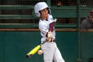 PHOTO BY FOREST WORGUM Montesanos Brody Messick (3) hits a bases-clearing triple in a 12-4 win over Aberdeen in a Majors Division District 3 Tournament first-round game on Saturday in Centralia.
