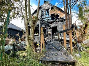 Michael S. Lockett / The Daily World
A vacant house in Hoquiam was destroyed Sunday night in a fire that damaged a neighboring house.