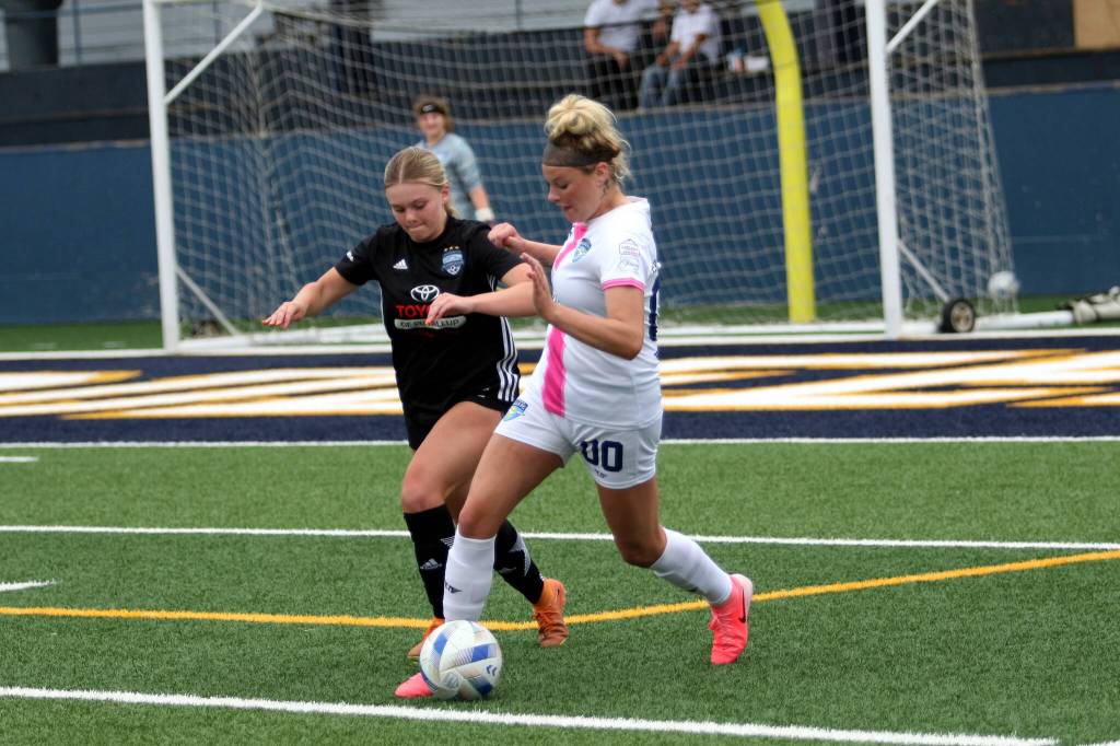 RYAN SPARKS | THE DAILY WORLD Grays Harbor Gulls midfielder Lillian Katrina (00) turns the ball up field during a 6-0 loss to Washington Premier Legends on Saturday at Stewart Field in Aberdeen.