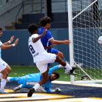 RYAN SPARKS | THE DAILY WORLD Grays Harbor Gulls goal keeper Alexis Garcia (bottom) dives in an attempt to stop a rebound after making a penalty-kick save at the end of a 3-2 loss to Twin City Union on Sunday in Aberdeen.