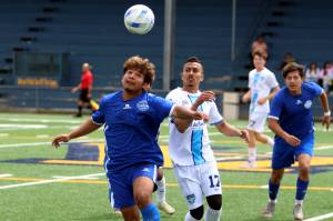 RYAN SPARKS | THE DAILY WORLD Grays Harbor Gulls midfielder Irvin Vincente (17) battles for possession during a 3-2 loss to Twin City Union on Sunday at Stewart Field in Aberdeen.