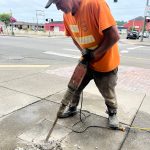 Matthew N. Wells / The Daily World
Jeff Stevens, lead carpenter for the city of Aberdeen, busts up pavement on a small patch of sidewalk that will host Darrell Westmorelands star. The music photographer is the 92nd Aberdeen Walk of Fame star recipient.