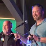 Matthew N. Wells / The Daily World
Darrell Westmoreland and Pat Anderson, right, share a moment during Andersons mini-roast of Westmoreland before the Music Photographer of the Stars received his honor on Saturday. While Anderson was funny, he was also sincere and applauded Westmorelands integrity as a photographer. Westmoreland has seen a lot of musicians in compromising positions, but never takes those photos, which protects their public image.