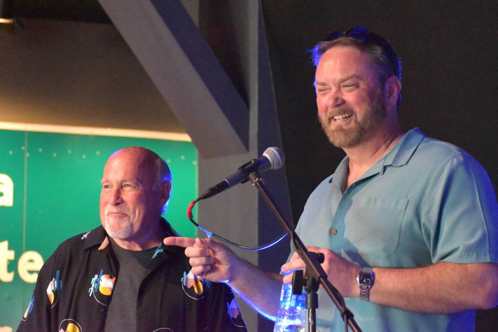 Matthew N. Wells / The Daily World
Darrell Westmoreland and Pat Anderson, right, share a moment during Andersons mini-roast of Westmoreland before the Music Photographer of the Stars received his honor on Saturday. While Anderson was funny, he was also sincere and applauded Westmorelands integrity as a photographer. Westmoreland has seen a lot of musicians in compromising positions, but never takes those photos, which protects their public image.