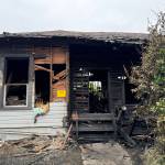 Michael S. Lockett / The Daily World
An Aberdeen home was destroyed by a fire on Saturday afternoon.