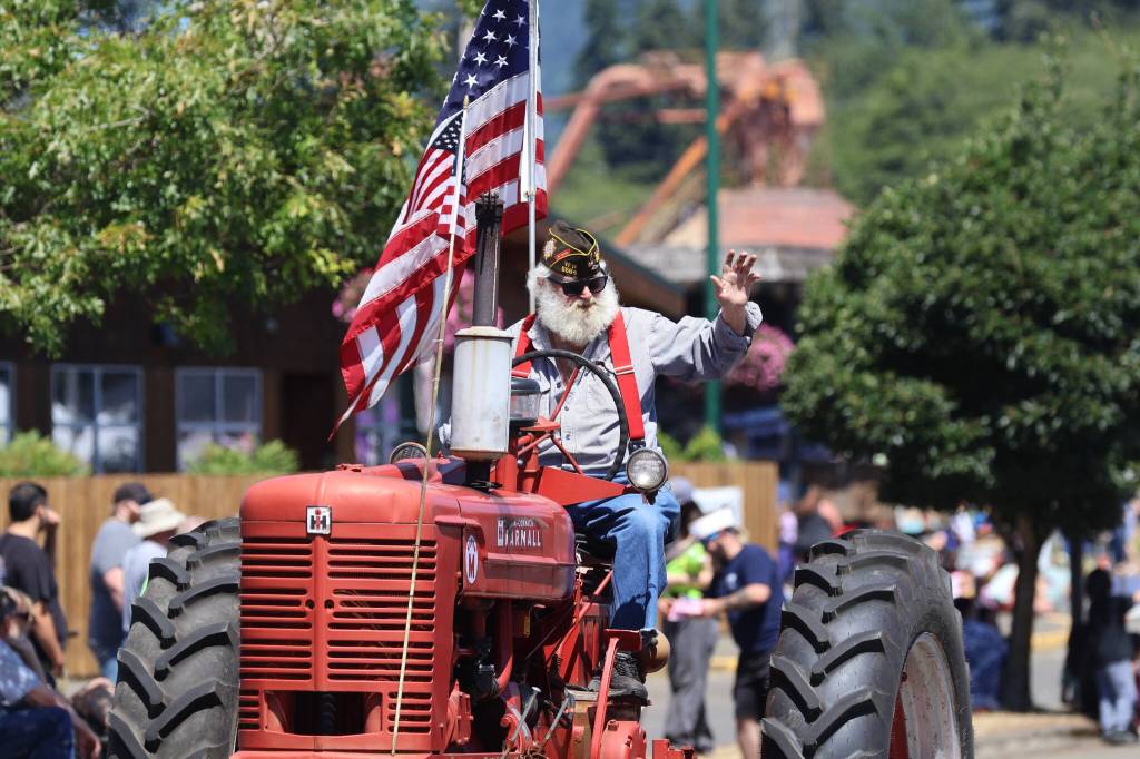 Hundreds of guests and throngs of residents gathered to watch the McCleary Bear Festival parade on Saturday. (Michael S. Lockett / The Daily World)