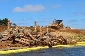 Michael S. Lockett / The Daily World
Machinery works around a new-built earthwork at a river conservation project on the Satsop River.
