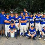 PHOTO COURTESY OF ELMA LITTLE LEAGUE Elmas Intermediate Little League all-star team poses for a photo after defeating Alaska 10-8 in a pool-play game of the Little League West Region Tournament on Friday in Nogales, Arizona.