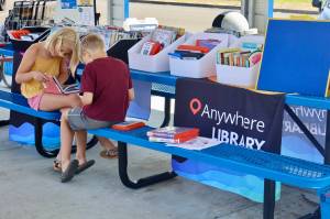 Michael S. Lockett / The Daily World
Kids read books during an Anywhere Library visit to Cosmopolis, the first stop as the program stands up in the county.