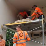 Michael S. Lockett / The Daily World
Cemetery workers place the remains in a crypt at Sunset Memorial Park.