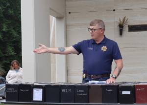 Michael S.Lockett / The Daily World
County Coroner George Kelley speaks during a brief ceremony, interring the unclaimed dead.