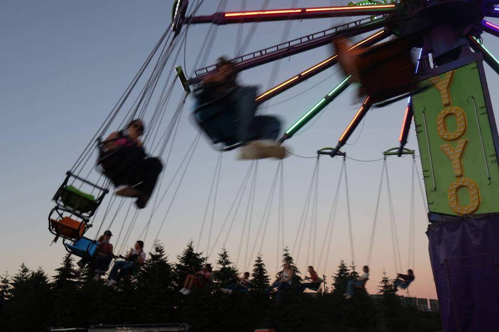 Michael S. Lockett / The Daily World
Riders spin and spin and spin.