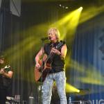 Matthew N. Wells / The Daily World
Doug Shepard, center, who is frontman for Crush Bon Jovi Experience, a Jon Bon Jovi cover band known for playing all of the rock stars hits, turned it up to 11 for their fans on Saturday night at the Grays Harbor County Fair.