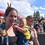 Matthew N. Wells / The Daily World
Melody Wilson, left, her two-year-old Raylan and her 12-year-old Peyton, enjoy their time Saturday at the Grays Harbor County Fair in Elma. The fair saw so many smiles and there was so much laughter as people, like the Wilsons, rode spinning rides, such as the Zipper, played carnival games, ate huge portions of curly fries and quenched their thirst on cold lemonade.