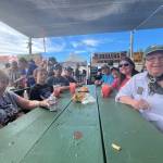 Matthew N. Wells / The Daily World
Tori Anderson, right, and her family was a fan of many parts of Saturday  from the food, drink, rides and games. They were also fans of the weather. Im glad the weather wasnt too bad today, Anderson said. It was supposed to be miserably hot. It got downgraded to reasonable.