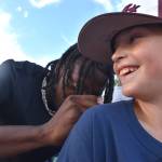 Matthew N. Wells / The Daily World
Tariq Woolen made a lot of people laugh and smile, like this Montesano child, on Saturday at the Grays Harbor County Fair, in Elma.