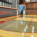 RYAN SPARKS | THE DAILY WORLD Part of the improvements to the new floor at Hoquiam Square Garden are colored 2-point areas, painted end lines and matching graphical fonts.