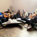 Matthew N. Wells / The Daily World
From left: Doug Paling, Wil Russoul, Norma Carter, Adam Carter and Jane Sharp all enjoy the impromptu jam session that Noon Tunes offers musicians and music lovers at Tinderbox Coffee Roasters  113 E. Wishkah St., in Aberdeen.