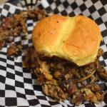 Matthew N. Wells / The Daily World
The brisket burger, specially cooked here, has a slightly spicy mop sauce that compliments the chopped brisket, which is delicious.