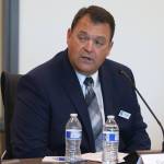 Darrin Raines, CEO of Greater Grays Harbor Inc., speaks during a round table with Sen. Marie Cantwell on Wednesday.