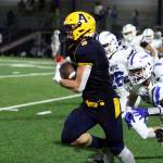 RYAN SPARKS | THE DAILY WORLD Aberdeen running back Micah Schroeder sprints away from the Olympic defense during a 20-6 loss on Friday at Stewart Field in Aberdeen.