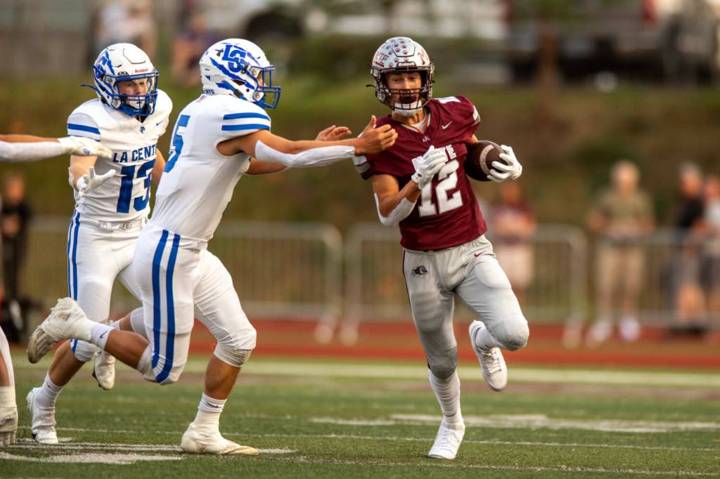 PHOTO BY FOREST WORGUM Montesano running back Terek Gunter (12) carries the ball during a 35-7 loss to La Center on Friday at Montesano High School.